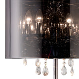 Close-up of the Trace 4 Light Crystal Floor Lamp featuring a chrome base, chrome shade, crystal droplets below, and multiple illuminated bulbs reflected inside.