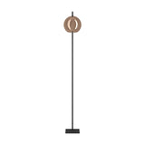 Trelbette Floor Lamp in black steel with a round copper-finish glass globe shade, slim stand on a square base, shown on a plain white background.