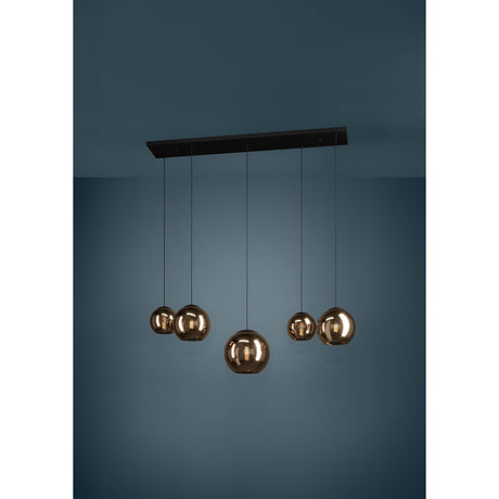 Trelbette Glass 5 Light Linear Pendant Light in black, featuring a black steel ceiling bar with five mirrored copper-toned glass globes at varying heights on slim black cables.