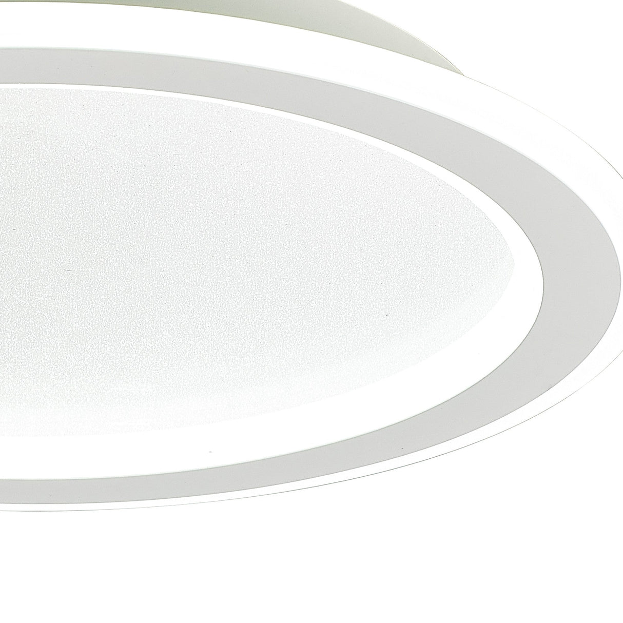 Close-up of the Mantra Tulum white flush ceiling light showing the polycarbonate ring frame and textured crystalline centre diffuser.