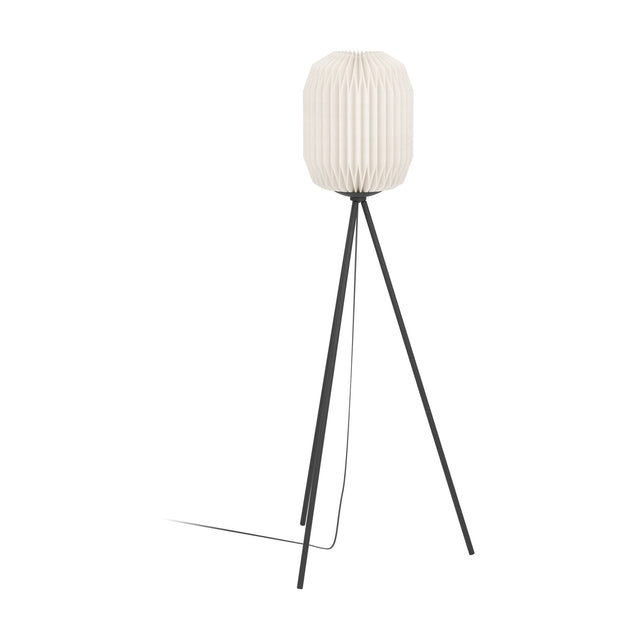 Vavanne tripod floor lamp with black steel legs and a tall pleated white paper lantern shade, shown on a plain white background.