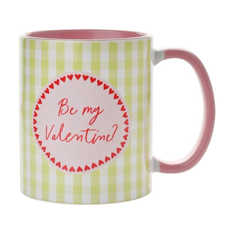 Green and white gingham stoneware mug with pink handle and interior, featuring a "Be my Valentine?" heart-bordered design, 11oz, on a plain white background.