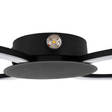 Close-up of the Venticello LED flush ceiling light's black central disc showing the integrated LED module and ring arms, on a plain white background.