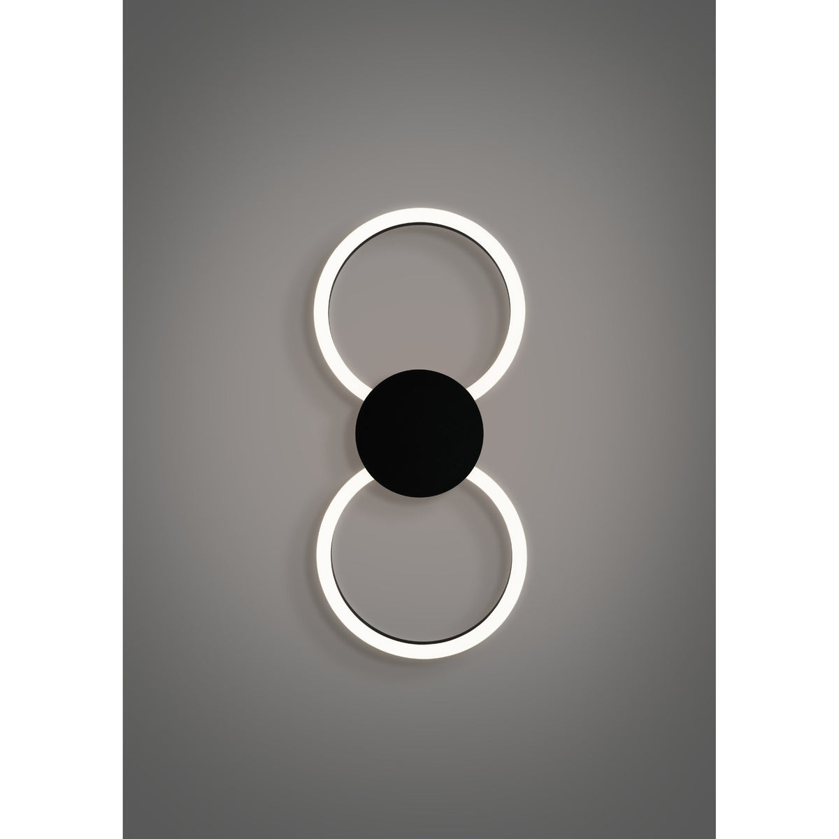 Venticello LED flush ceiling light in black aluminium with two linked illuminated rings joined by a round central disc, white plastic diffusers glowing softly, shown against a grey background.