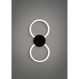 Venticello LED flush ceiling light in black aluminium with two linked illuminated rings joined by a round central disc, white plastic diffusers glowing softly, shown against a grey background.