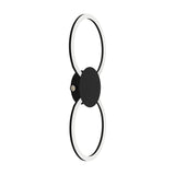 Venticello LED flush ceiling light in black aluminium, shaped as two linked rings with white plastic diffusers and a round central disc, shown on a plain white background.