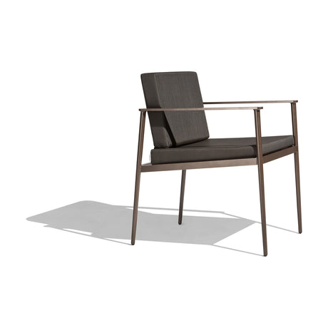 Vint Aluminium Garden Dining Armchair with a slim tapered brown aluminium frame, open arms, and removable dark grey seat and back cushions, shown on a plain white background.