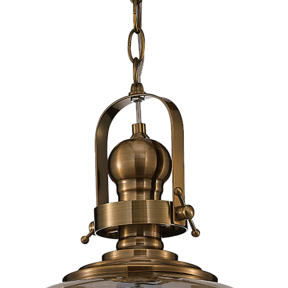 Close-up of the Vintage 33cm Bell pendant light showing the antique brass cap, hinged frame top and chain suspension against a white background.
