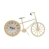 Vintage Bicycle Mantel Clock in cream with gold accents, featuring a round quartz clock face with Arabic numerals in place of the rear wheel, set against a plain white background.