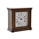 Square Westminster Chime Mantel Clock in walnut effect brown case with fluted side columns, white dial, black Roman numerals and spade hands, on a plain white background.