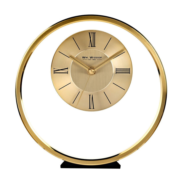 Round gold metal mantel clock with a slim outer ring and a two-tone dial featuring black Roman numerals and baton markers, set on a small black base against a white background.