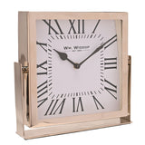 Square mantel clock with a polished silver frame and bracket stand, white dial, bold black Roman numerals, and black hands, shown on a plain white background.