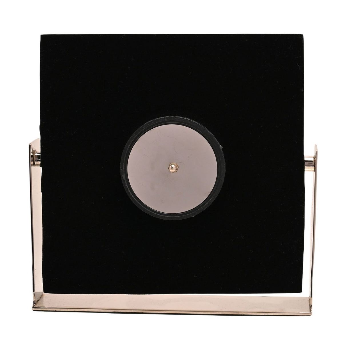 Rear view of the Square Roman Numeral Mantel Clock 22.5cm in silver and white, showing black velvet backing, chrome frame and stand, and winding mechanism.