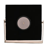 Rear view of the Square Roman Numeral Mantel Clock 22.5cm in silver and white, showing black velvet backing, chrome frame and stand, and winding mechanism.