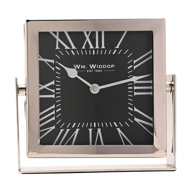 Square silver-framed mantel clock with black dial, white Roman numerals, and silver hands, mounted on a matching silver stand against a plain white background.