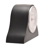 Napoleon resin mantel clock in matt black with arched hat-shaped case, round white dial, silver rim, black Arabic numerals and slim silver hands, shown on a plain white background.