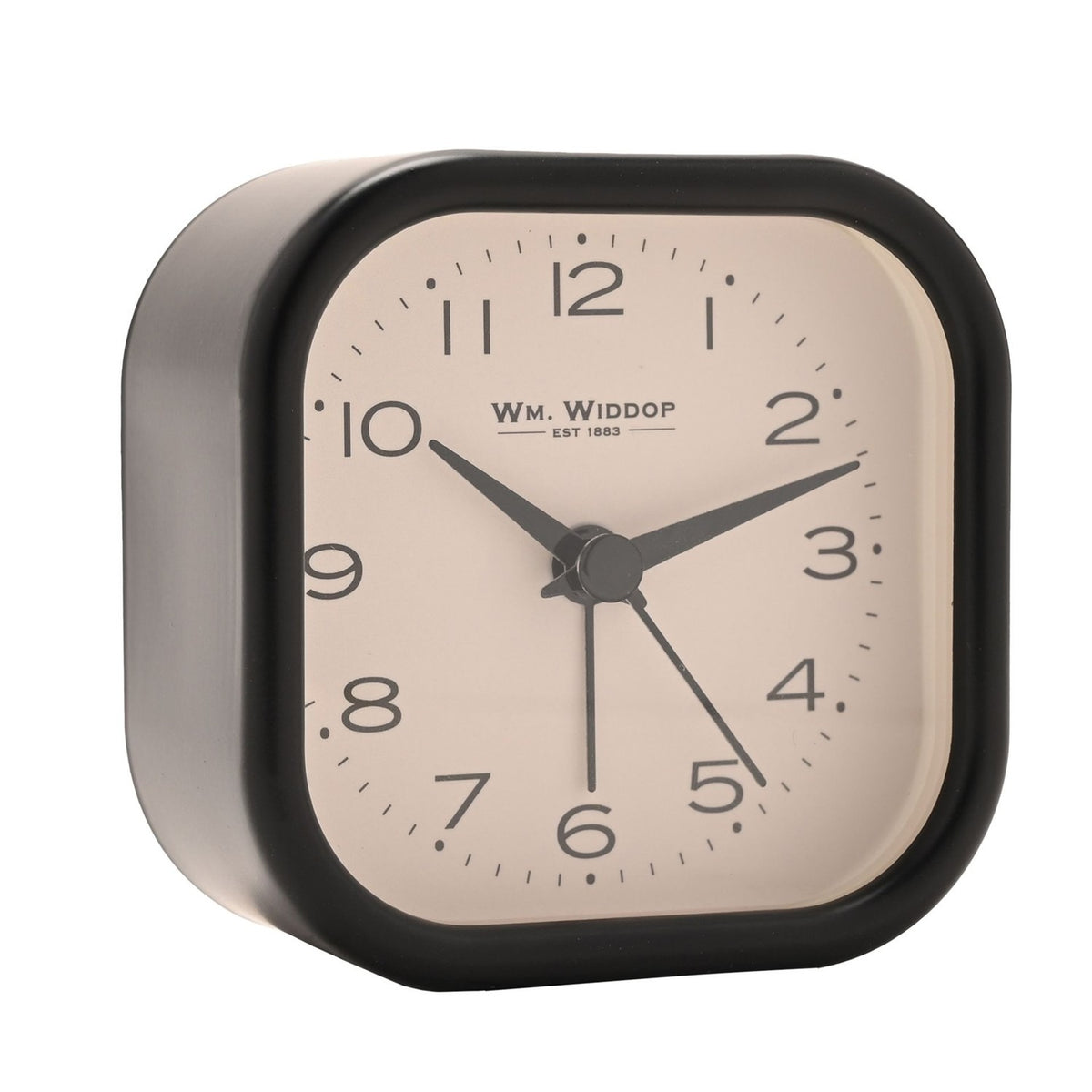 Rounded square metal alarm clock in black with a cream dial, bold Arabic numerals, and slender black hands, shown on a plain white background.