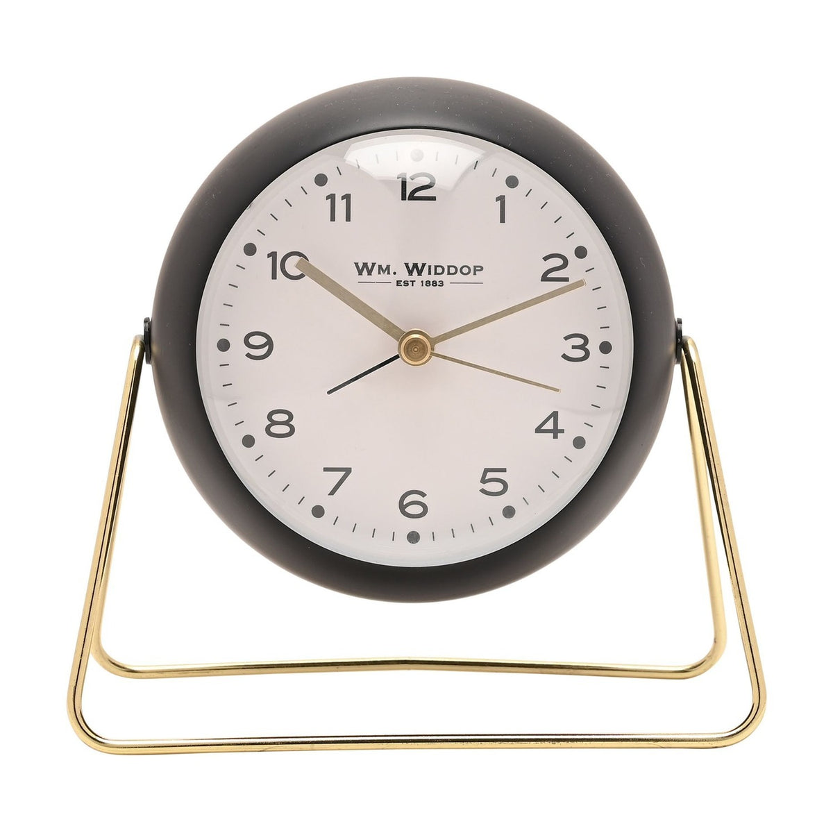 Medium Kent round metal alarm clock in matt black with a white dial, gold hands, and numbers one to twelve, set on a slim gold wire stand against a plain white background.