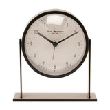 Round adjustable metal alarm clock, 13.5cm, with a white dial and black case mounted on upright arms over a flat black base, shown on a plain white background.