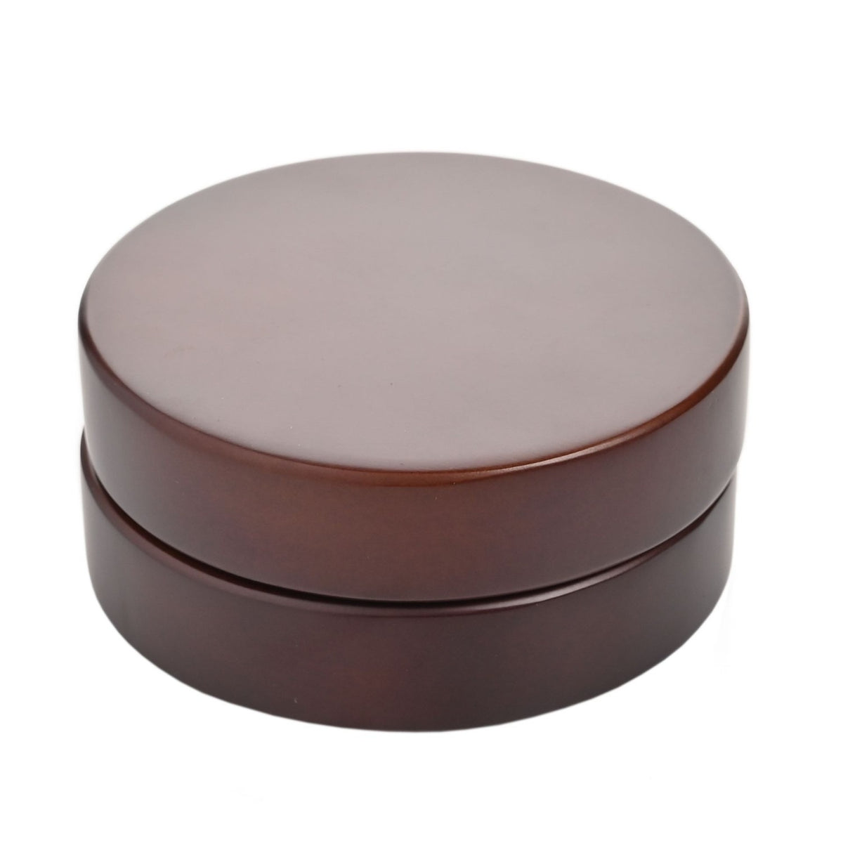 Closed walnut finish folding mantel clock with compass, shown as a round disc case on a plain white background.