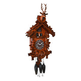 Stag Wooden Quartz Cuckoo Wall Clock in mahogany, carved wood with stag head, leaf details, roundabout figures, bird, pinecone weights and chains, on a white background.