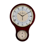 Keyhole-shaped wooden wall clock in reddish brown gloss finish with Roman numeral dial, gold-tone bezel, and a smaller thermometer and hygrometer gauge below, on a white background.