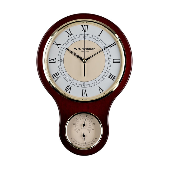Keyhole-shaped wooden wall clock in reddish brown gloss finish with Roman numeral dial, gold-tone bezel, and a smaller thermometer and hygrometer gauge below, on a white background.