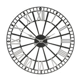 Round metal skeleton wall clock with open spoke frame, silver Roman numerals, silver hands, black centre hub, and a cut-out rim with diamond markers, shown on a plain white background.