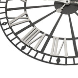 Close-up of the Retro Roman Numeral Metal Skeleton Wall Clock, 49cm, showing silver numerals over a black open spoke frame with silver hands and square cut-out rim detail.
