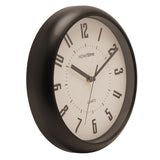 Round wall clock, 25.5cm, with black frame and white dial featuring bold black numerals, black hour and minute hands, slim second hand, and Quartz text, shown at an angle on a white background.