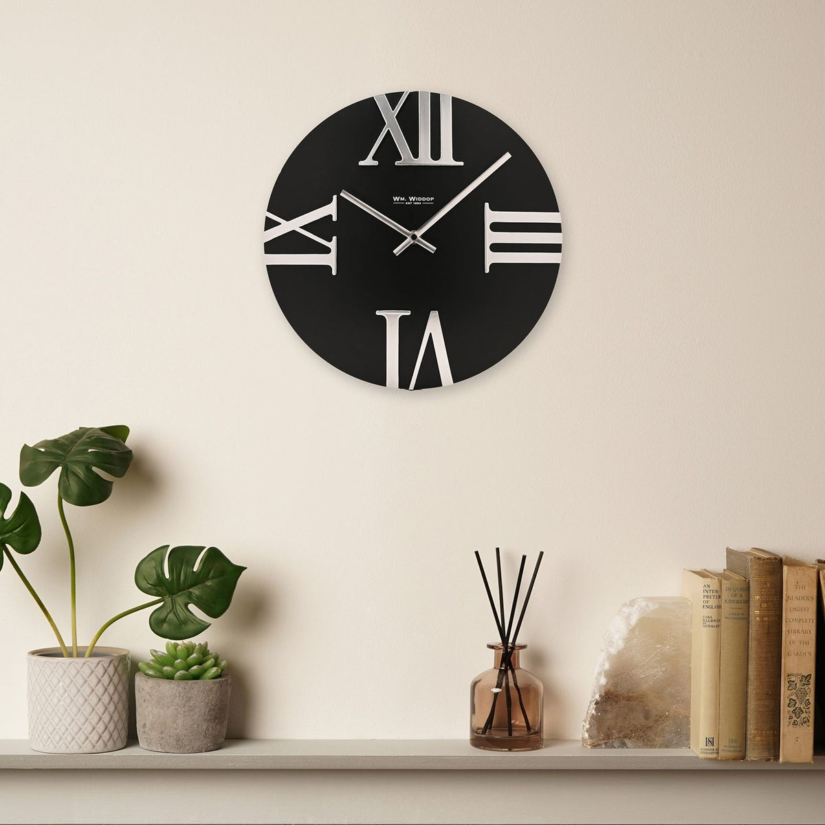 Round Wall Clock with Raised Roman Numerals 31.5cm - Black