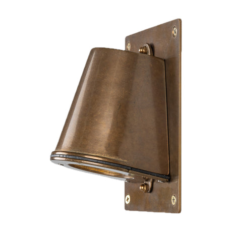 Wade Brass Outdoor Wall Light IP54, a tapered cone-shaped fixture on a rectangular backplate with a glass lens base, shown on a plain white background.