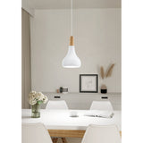 Walette Wooden Pendant Light 18cm in White hangs above a dining table, showing its teardrop steel shade and wood collar in a neutral-toned dining room.
