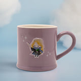Purple stoneware mug with cream interior, featuring an embossed Luna from Harry Potter holding a wand and green book, with white star details, on a light blue background.