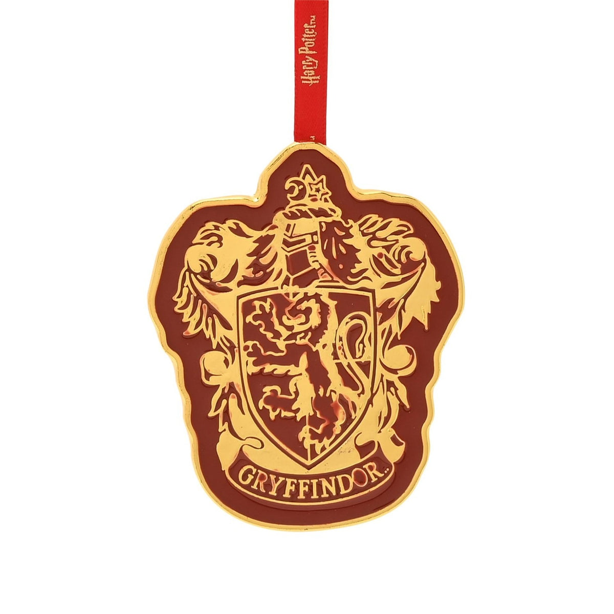 Harry Potter Gryffindor metal hanging decoration with gold crest, lion shield and knight helmet on deep red enamel, red ribbon, plain white background.