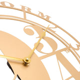 Close-up of the Harry Potter Platform 9¾ cut-out round wall clock in metallic gold, showing slim gold hands, bold 9¾ numeral and open-ring numerals against a white background.