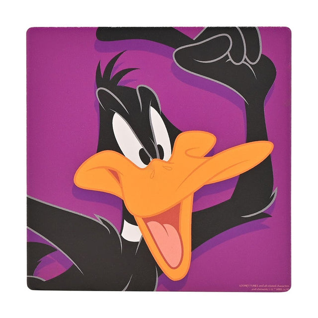 Square ceramic coaster with cork back featuring a close-up of Daffy Duck, wide-eyed with open orange beak and wing raised, set against a bold purple background.