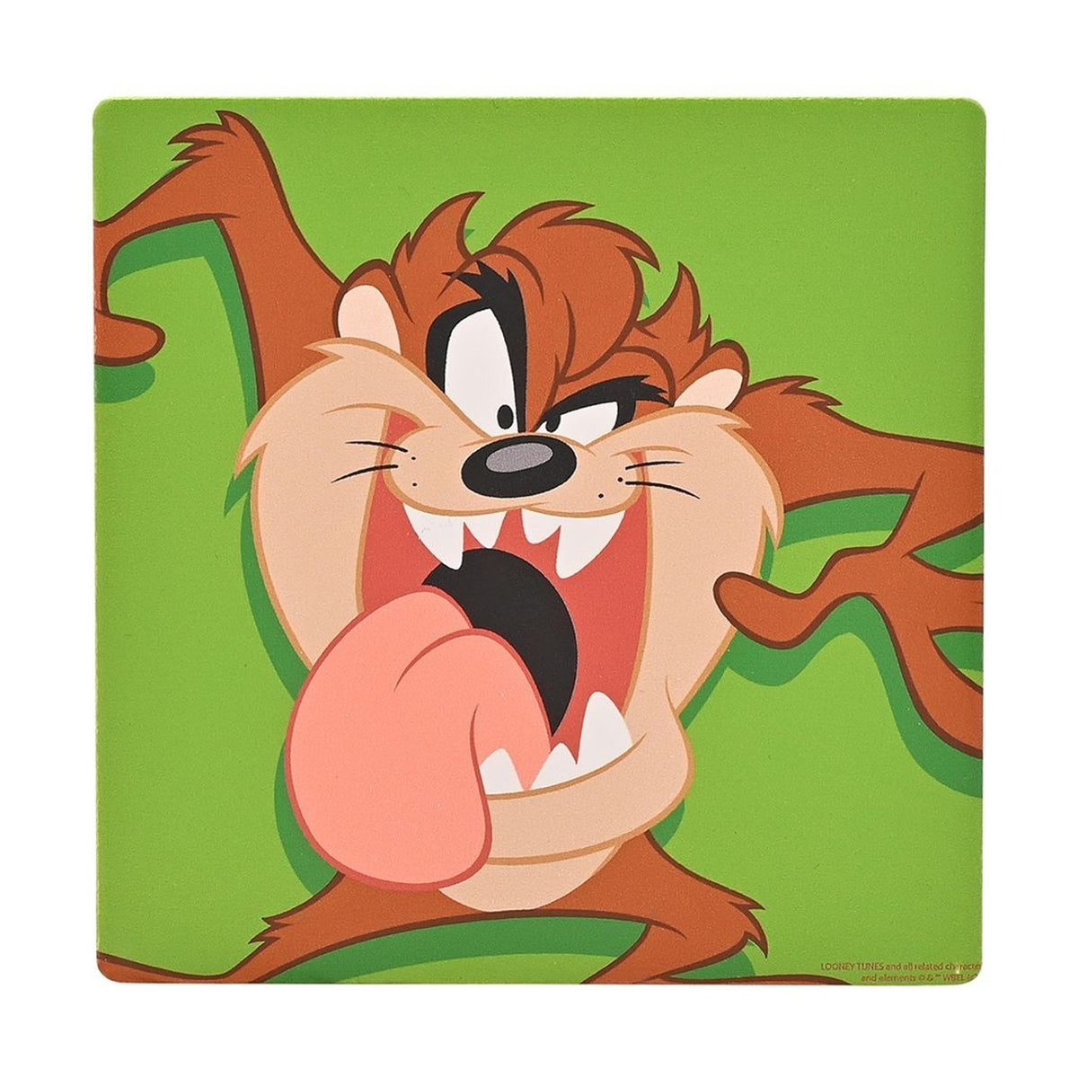 Square ceramic coaster featuring the Tasmanian Devil mid-spin with a wide toothy grin and tongue out, illustrated in brown and tan against a bold green background.