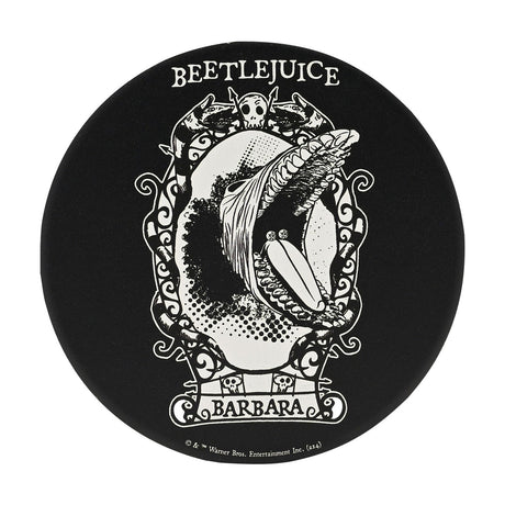 Round black ceramic coaster featuring a white Beetlejuice illustration of a stretched, toothy face in an ornate scrolled frame, labelled "Barbara," on a plain white background.