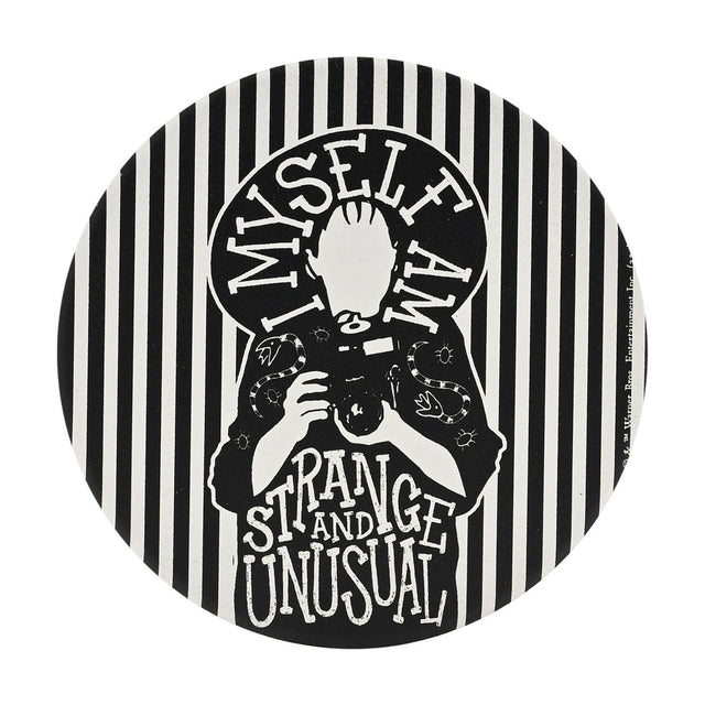 Round white ceramic coaster featuring a black Beetlejuice design of a silhouetted figure holding a camera, with "I Myself Am Strange and Unusual" lettering and a striped border, on a plain background.