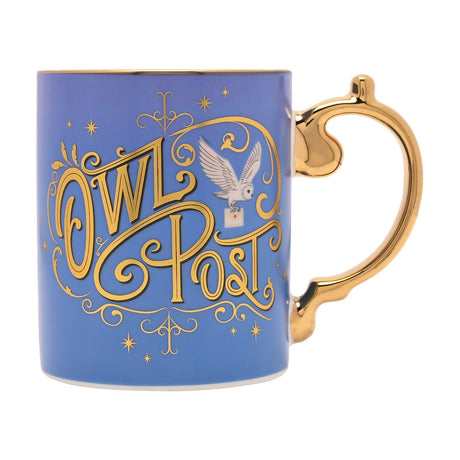 Harry Potter Owl Post porcelain mug in blue with gold script, owl and stars design, and a gold scrolled handle, shown on a plain white background.
