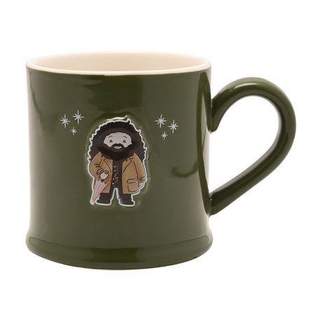 Harry Potter Hagrid Embossed Stoneware Mug in glossy olive green, featuring a raised Hagrid figure with brown coat and pink umbrella amid white sparkles, white interior, on a plain background.