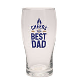Clear pint beer glass with a pub-style curved shape, printed in navy blue with "Cheers to the Best Dad," a clinking bottles motif, and wheat sprigs, shown against a plain white background.