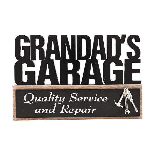 Wooden standing plaque reading Grandad's Garage in black cut-out letters, with a black panel reading Quality Service and Repair and a silver tool charm, on a white background.
