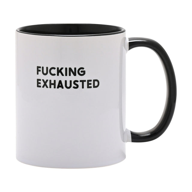 White ceramic mug with black interior and handle, printed "FUCKING EXHAUSTED" in bold black capitals on the white body, shown against a plain white background.