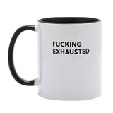 White ceramic mug with black interior and handle, printed with "FUCKING EXHAUSTED" in bold black capitals, 11oz, shown on a plain white background.