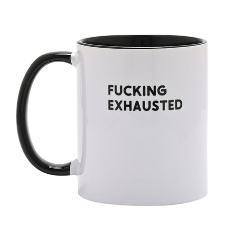 White ceramic mug with black interior and handle, printed with "FUCKING EXHAUSTED" in bold black capitals, 11oz, shown on a plain white background.