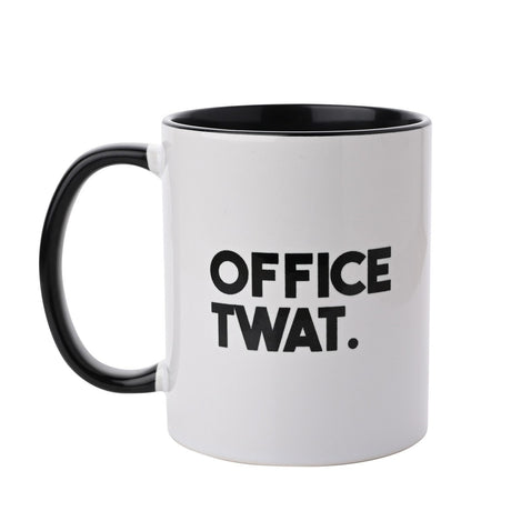 White stoneware mug with black handle and black interior, "OFFICE TWAT." printed in bold capitals on the glossy white exterior, shown against a plain background.