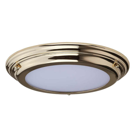The Welland LED Light Flush - Polished Brass is a round, flush-mount ceiling light with a polished brass frame and a white frosted glass diffuser. This IP54 rated fixture showcases a simple yet elegant design that complements both modern and classic interiors.