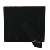 Rear view of the Mr & Mrs square photo frame in black velvet, showing a fold-out stand and an "Amore" branded tag, set against a plain white background.